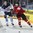 PARIS, FRANCE - MAY 14: Finland's Mikko Lehtonen #4 and Switzerland's Thomas Rufenacht #9 race for the puck during preliminary round action at the 2017 IIHF Ice Hockey World Championship. (Photo by Matt Zambonin/HHOF-IIHF Images)

